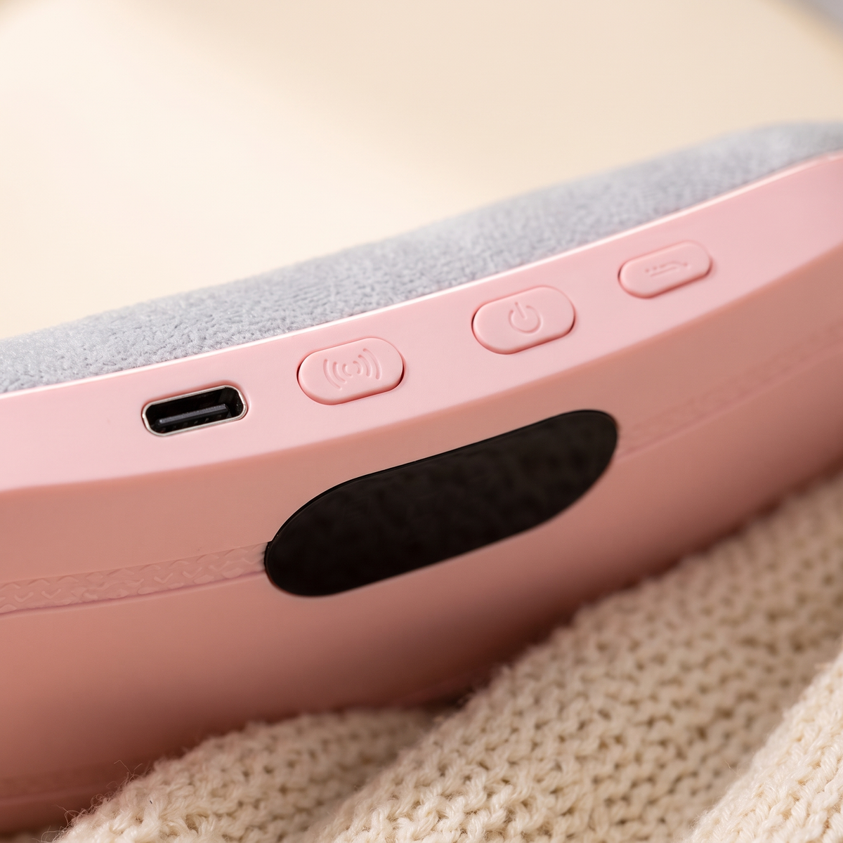 Close-up of the Kalmi belt buttons, USB-C port and display